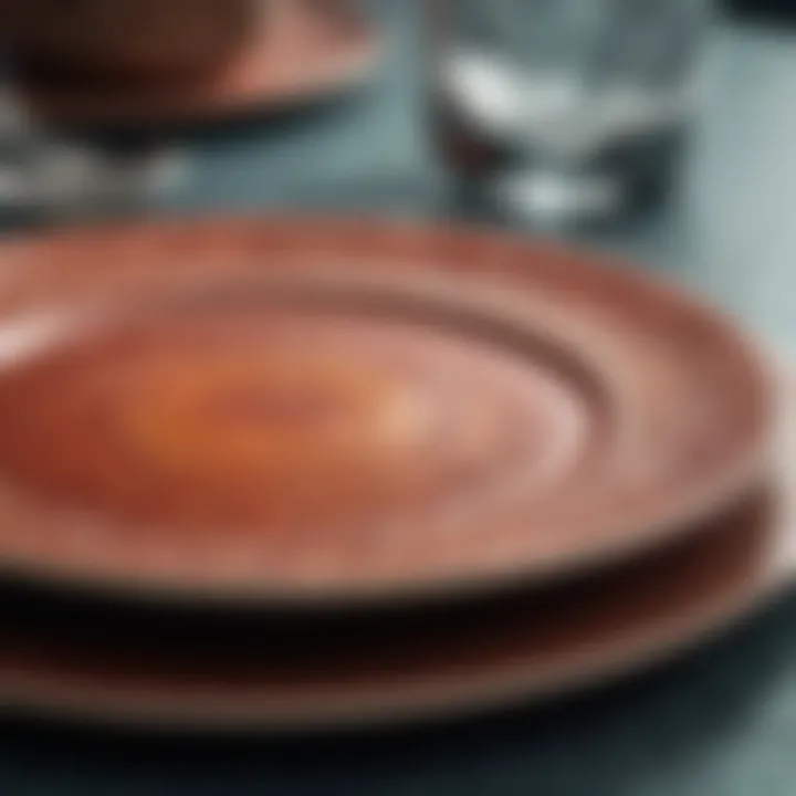 A close-up of uniquely crafted dinner plates emphasizing texture and color.